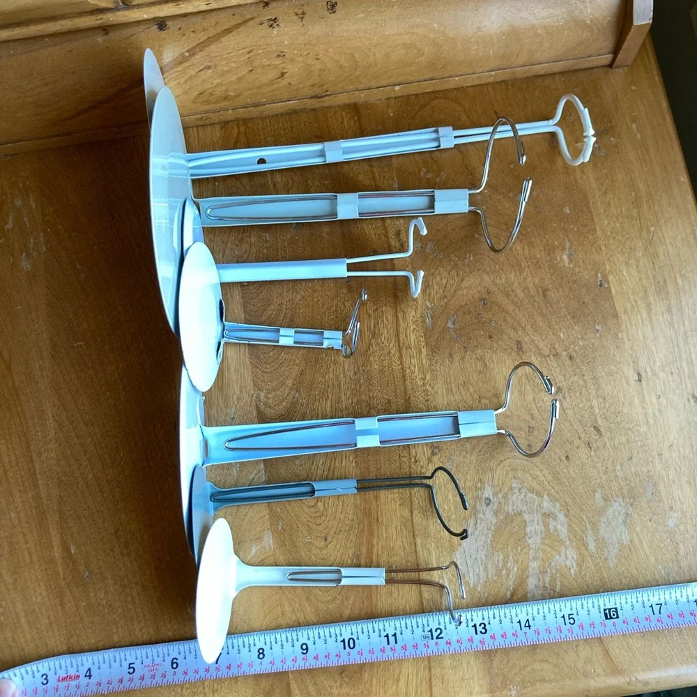 7 doll holders or White and Gray Jewelry Stands